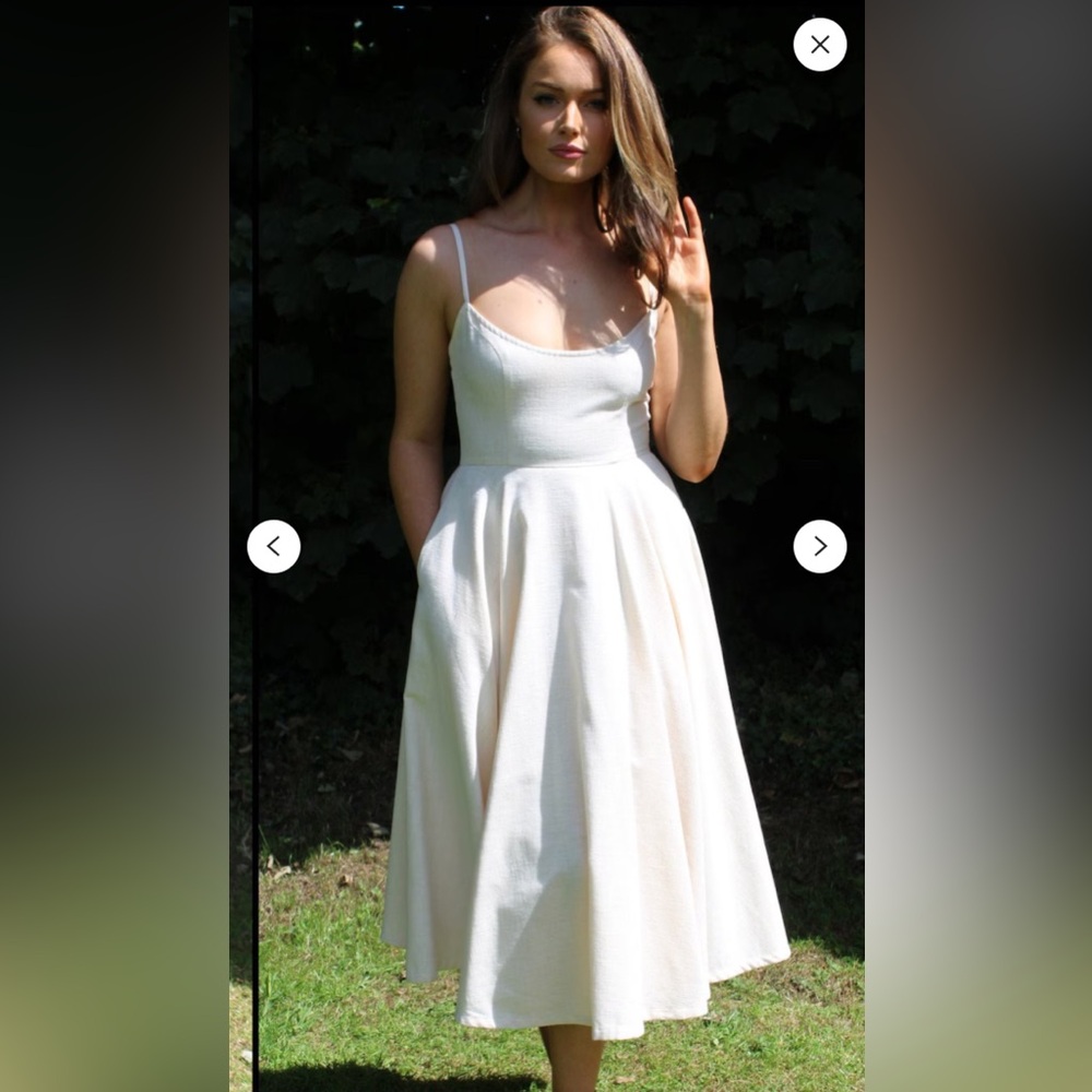 Laurel Lodge Elegant Cream Sleeveless 1950s Dress Wedding.